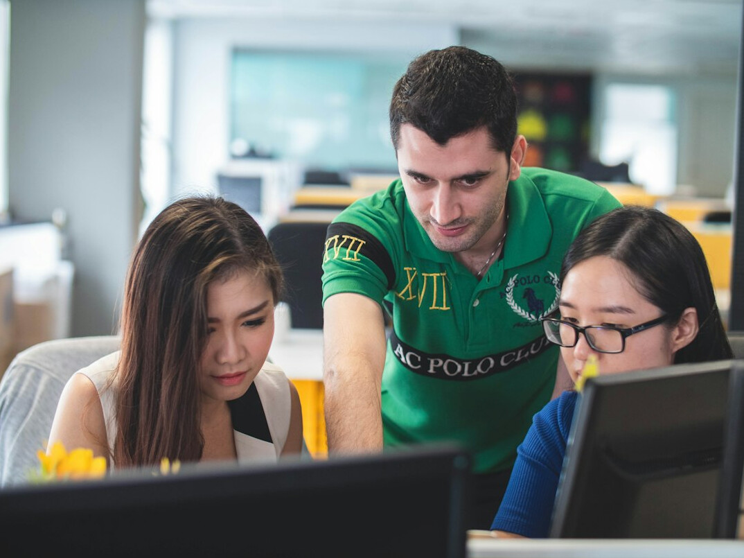 team discussing code