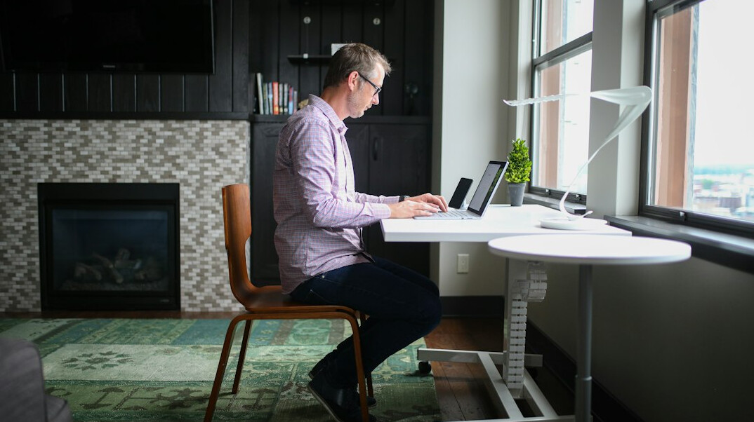 professional studying online at desk