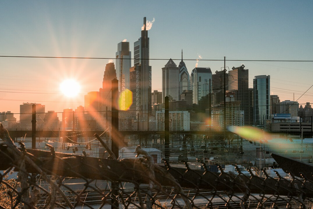 sunrise over city skyline
